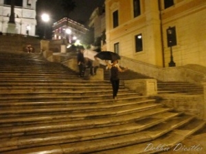 running-down-spanish-steps-in-rome